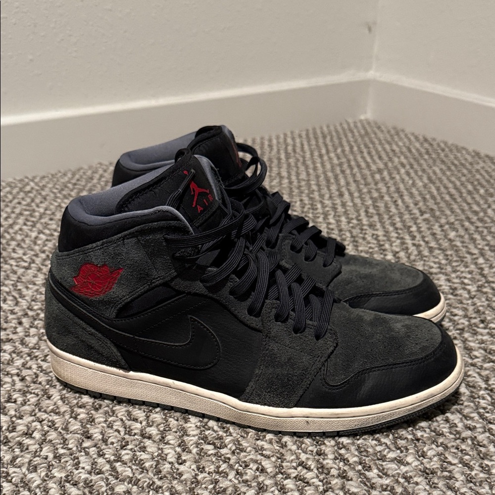 Nike Air Jordan Black and Dark Gray Sneakers with Red Accents